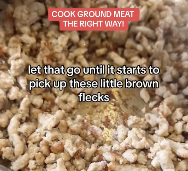 minced meat being browned in a frying pan
